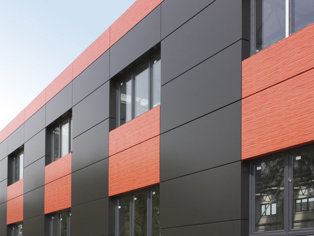 modern building with black and brown cladding